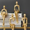 Golden Sitting Abstract Sculpture for Modern Home