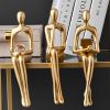 Golden Sitting Abstract Sculpture for Modern Home